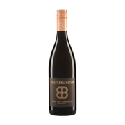 A bottle of Birgit Braunstein Blaufränkisch Heide Burgenland red wine. The bottle is dark glass with a copper-colored screw cap and a brown label featuring a stylized